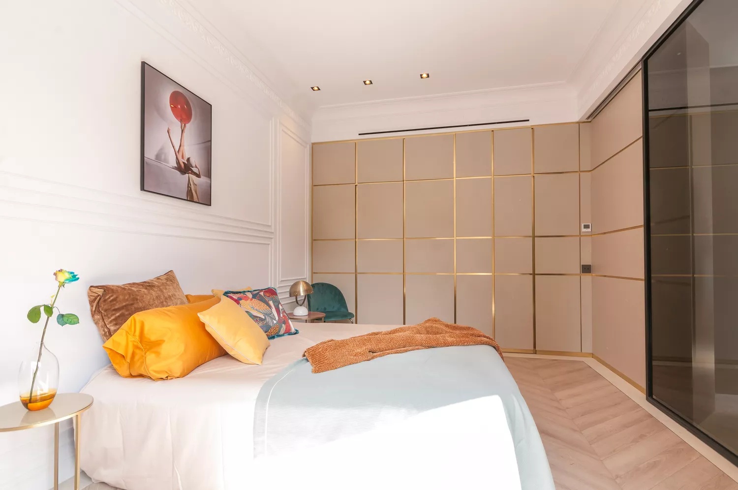 Modern bedroom with floor-to-ceiling windows and minimalist design