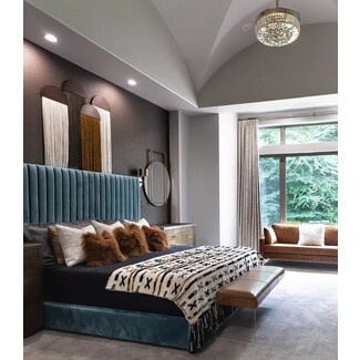 Modern bedroom with geometric patterns and bold colors