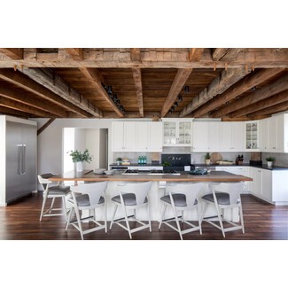 Rustic kitchen with white cabinets