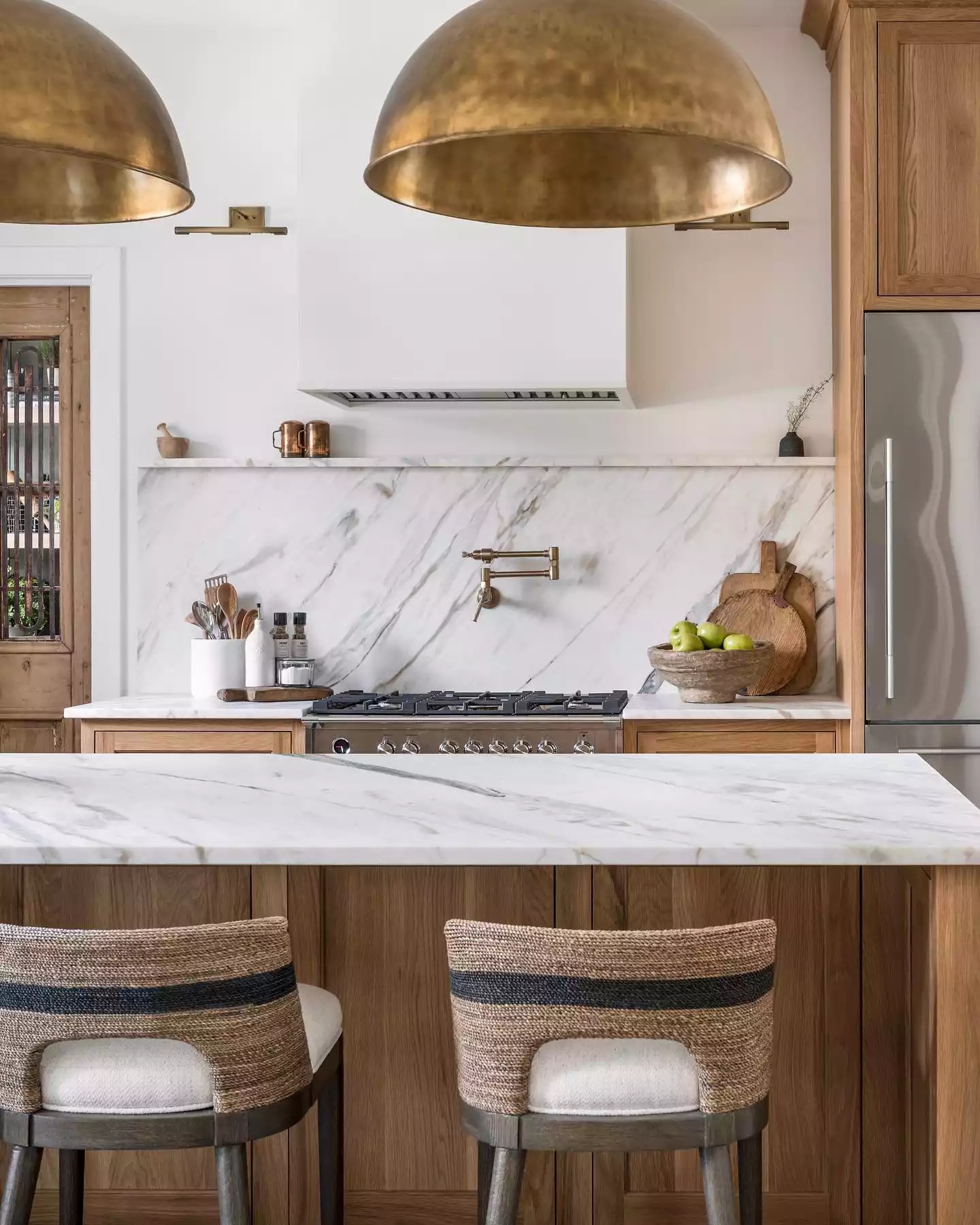 Salvaged wood island in rustic kitchen