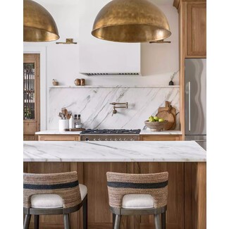 Salvaged wood island in rustic kitchen