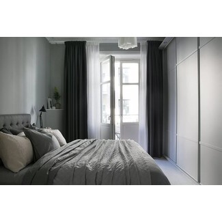 Scandinavian bedroom with neutral color palette and cozy textures