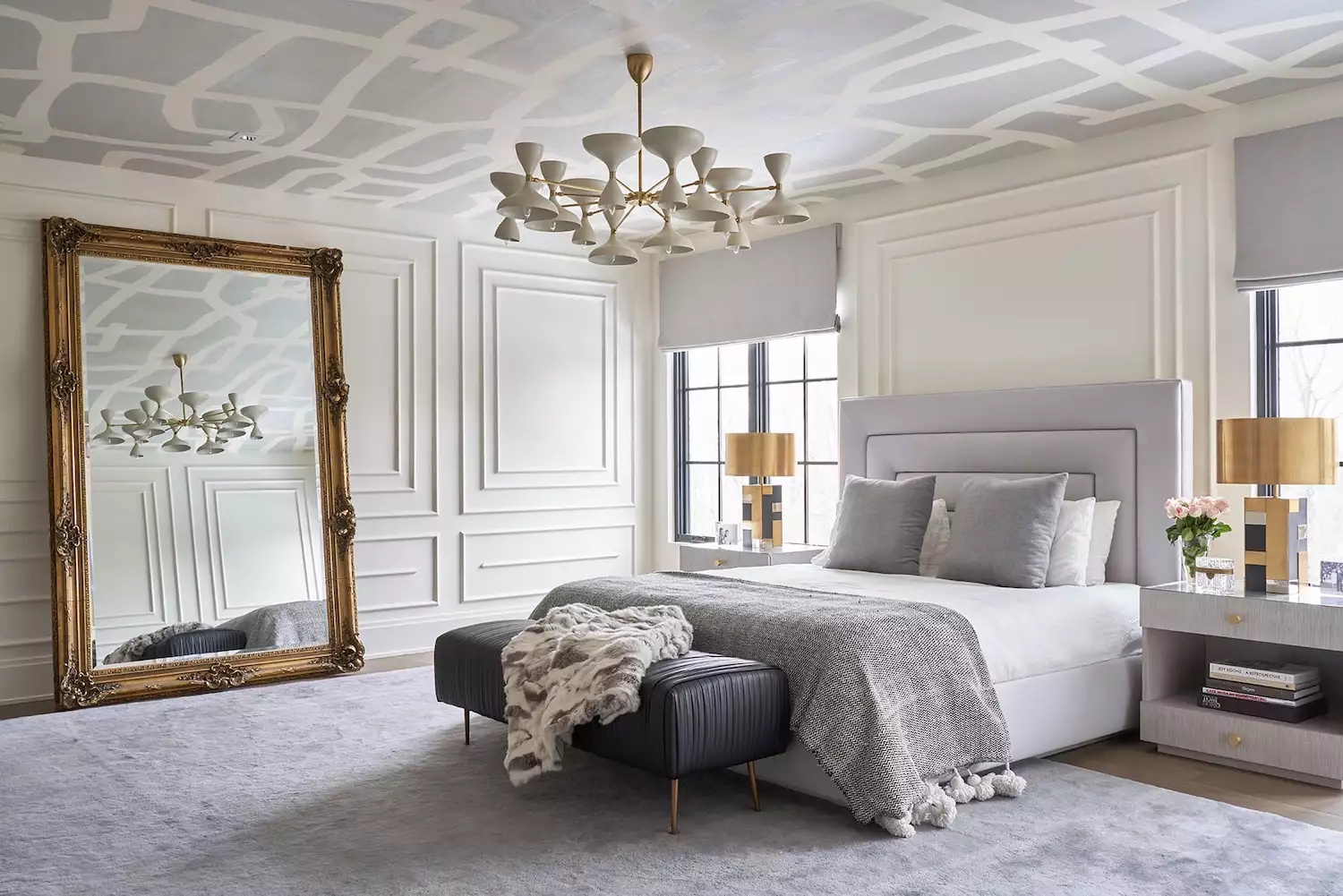 Sophisticated bedroom with textured walls and patterned rug