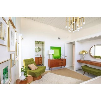 Spacious bedroom with sitting area and contemporary design