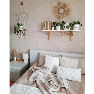 Stylish bathroom with black fixtures and marble tiles