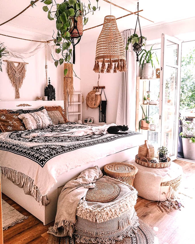 Airy Boho Bedroom: Rustic Branch Canopy, Woven Poufs