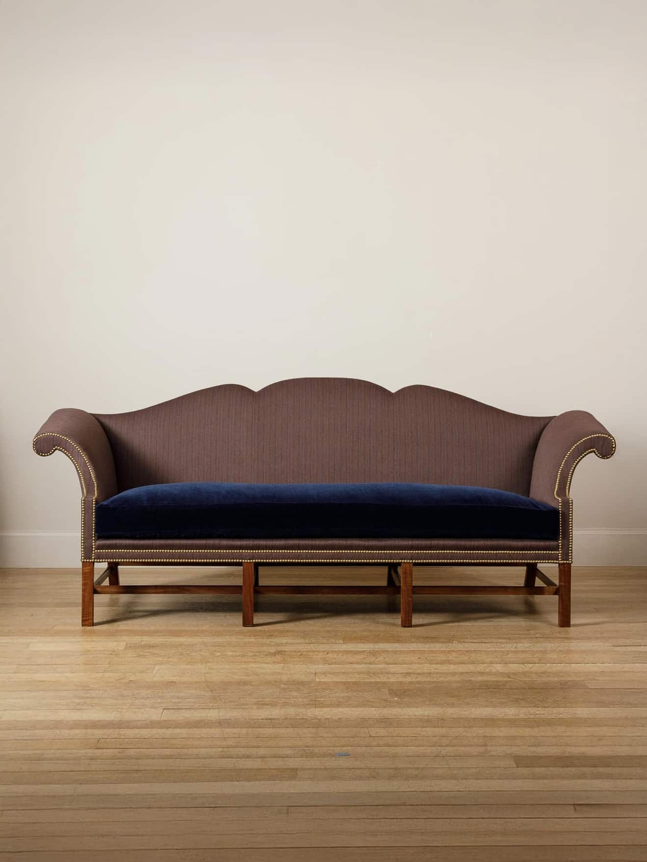Camelback Sofa Having Navy Velvet Seat Triple Arched Back Settee