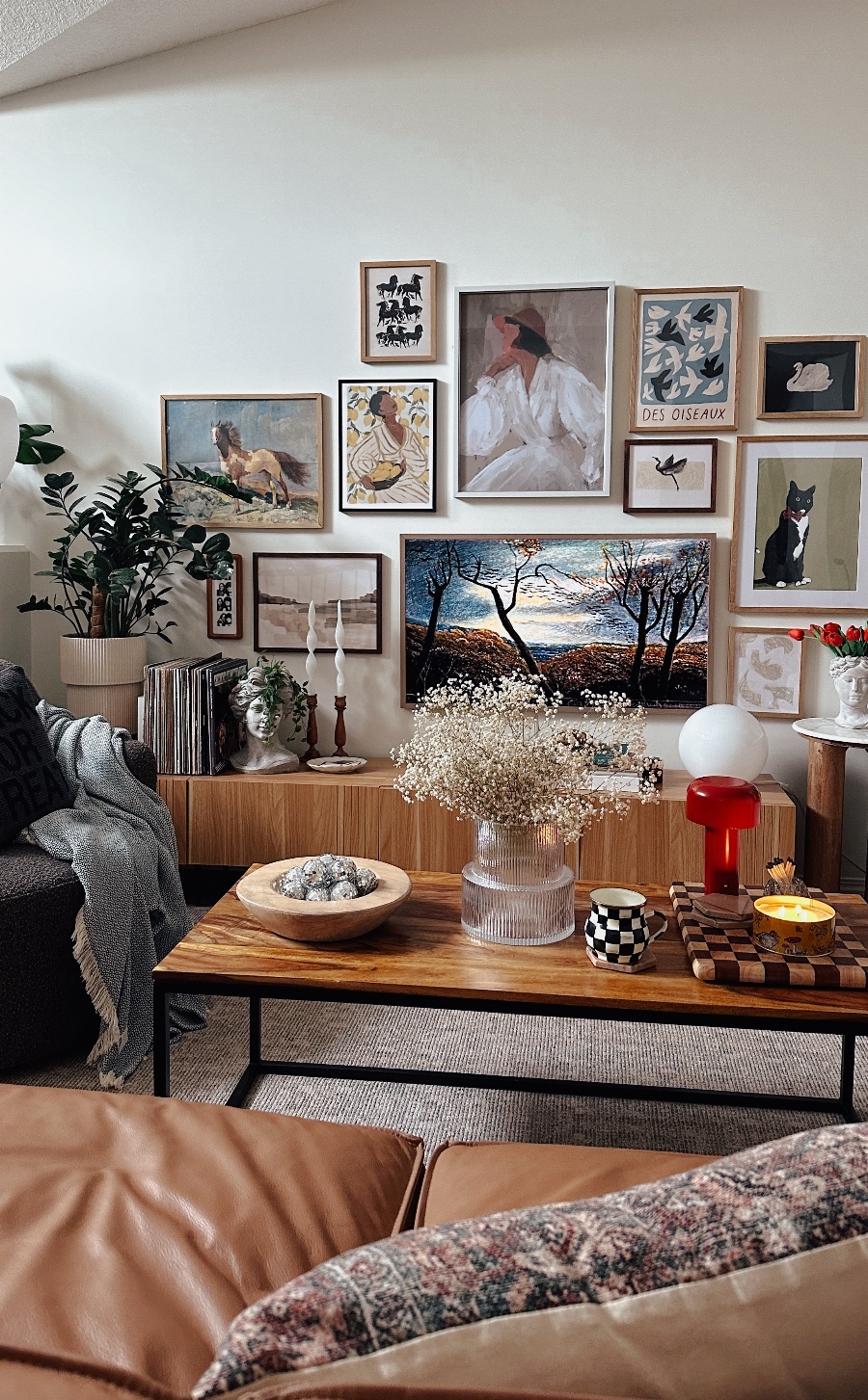 Caramel Sofa with Slouchy Aesthetic and Cozy Urban Interior
