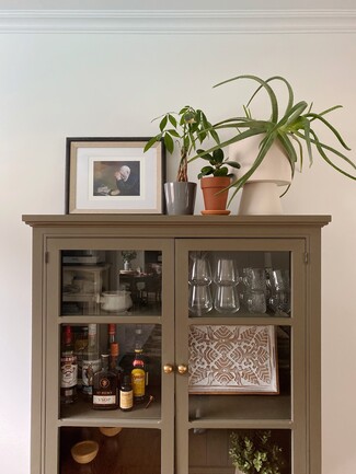 China Cabinet with Olive Green Finish and Bar Decor