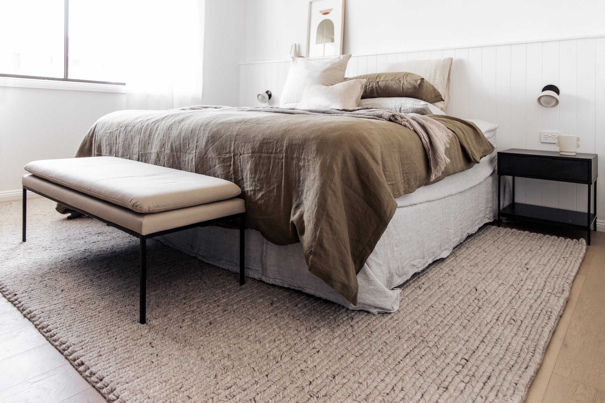 Chunky Knit Rug: Braided Texture in Scandinavian Bedroom