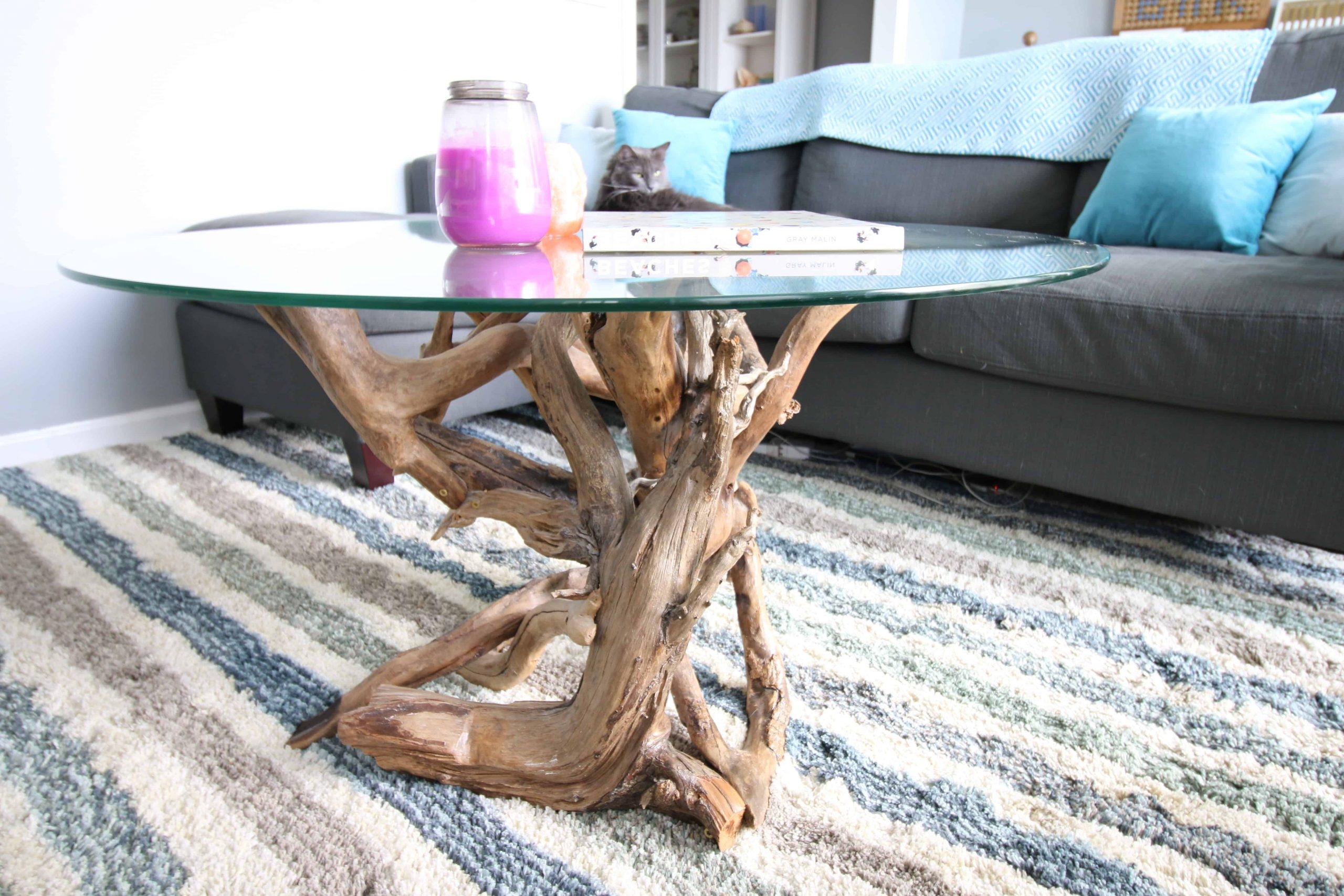 Coffee Table with Intertwined Branches and Circular Glass Surface