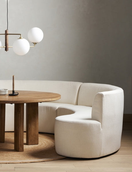 Dining Bench with Sculptural Curved Silhouette in Cream