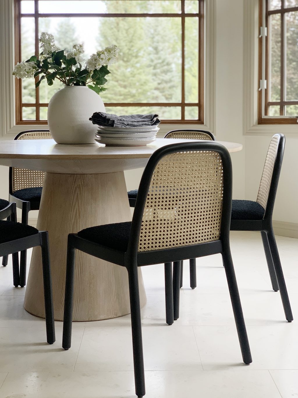 Dining Chair: Pedestal Table and Matte Black Frame