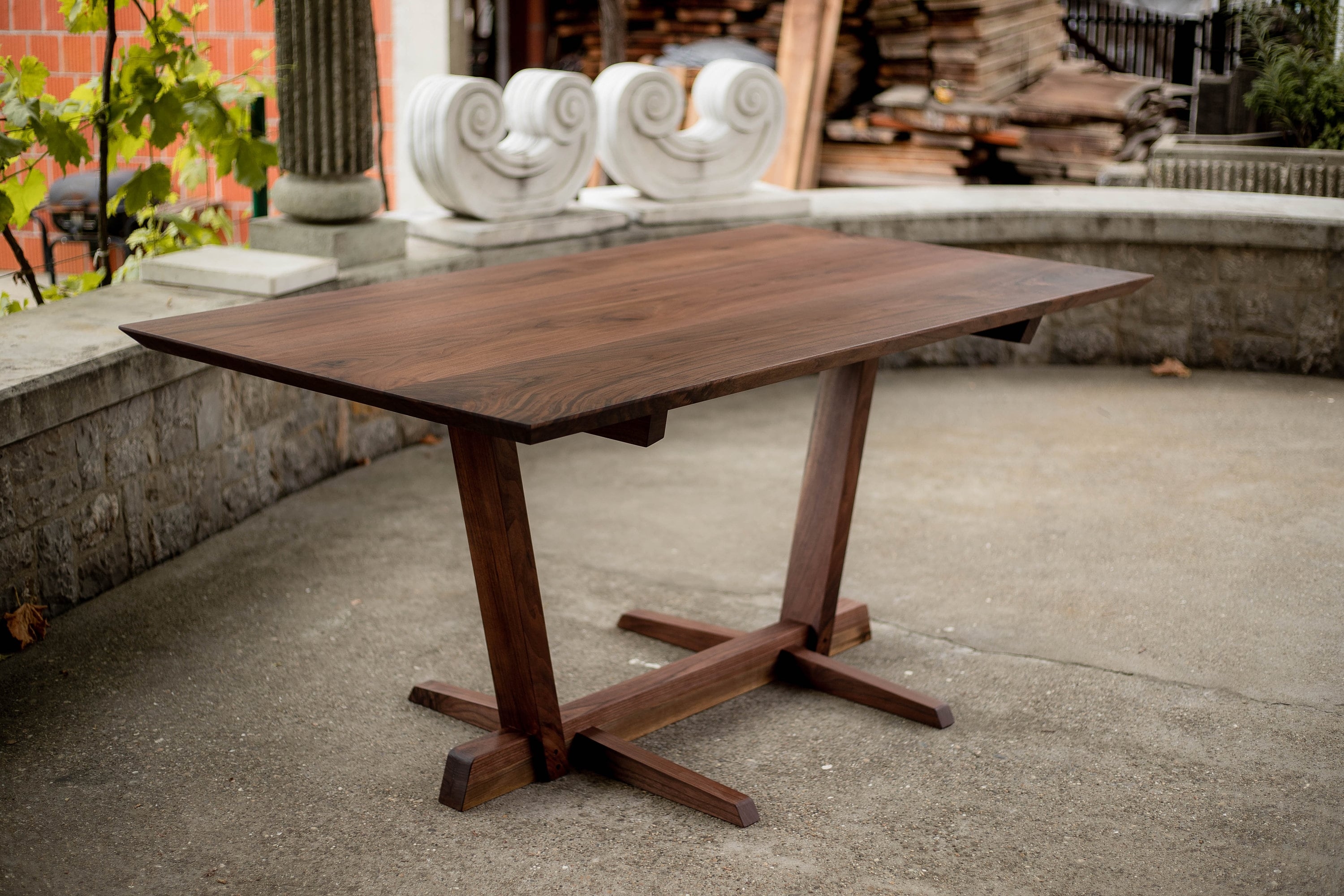 Dining Table with Beveled Edge and Splayed Leg Trestle