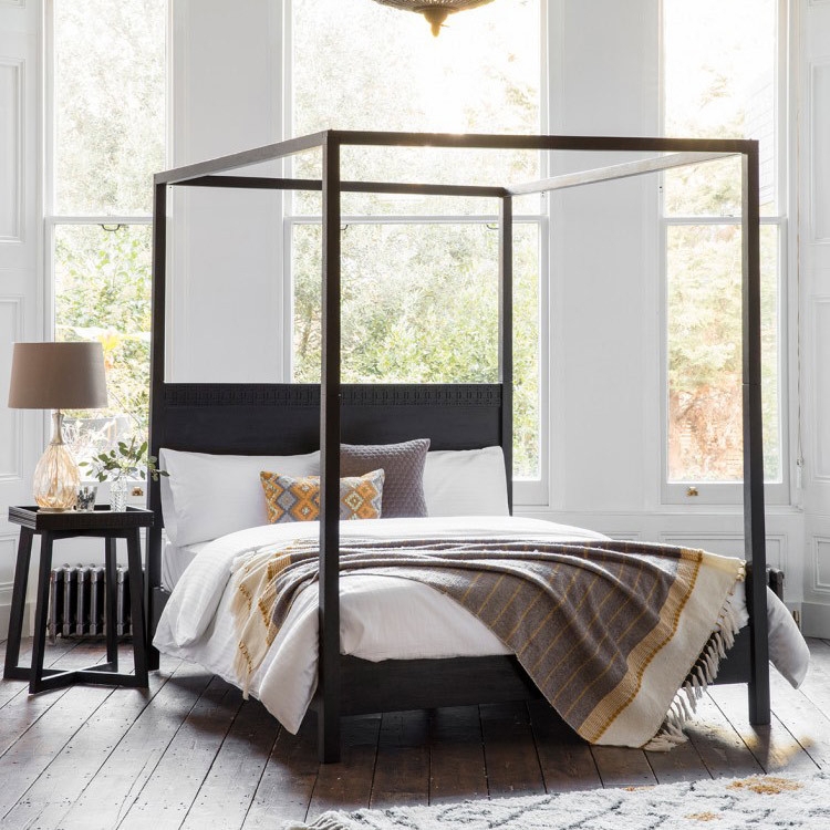 Four Poster Bed styling Carved Headboard and Boho Accents
