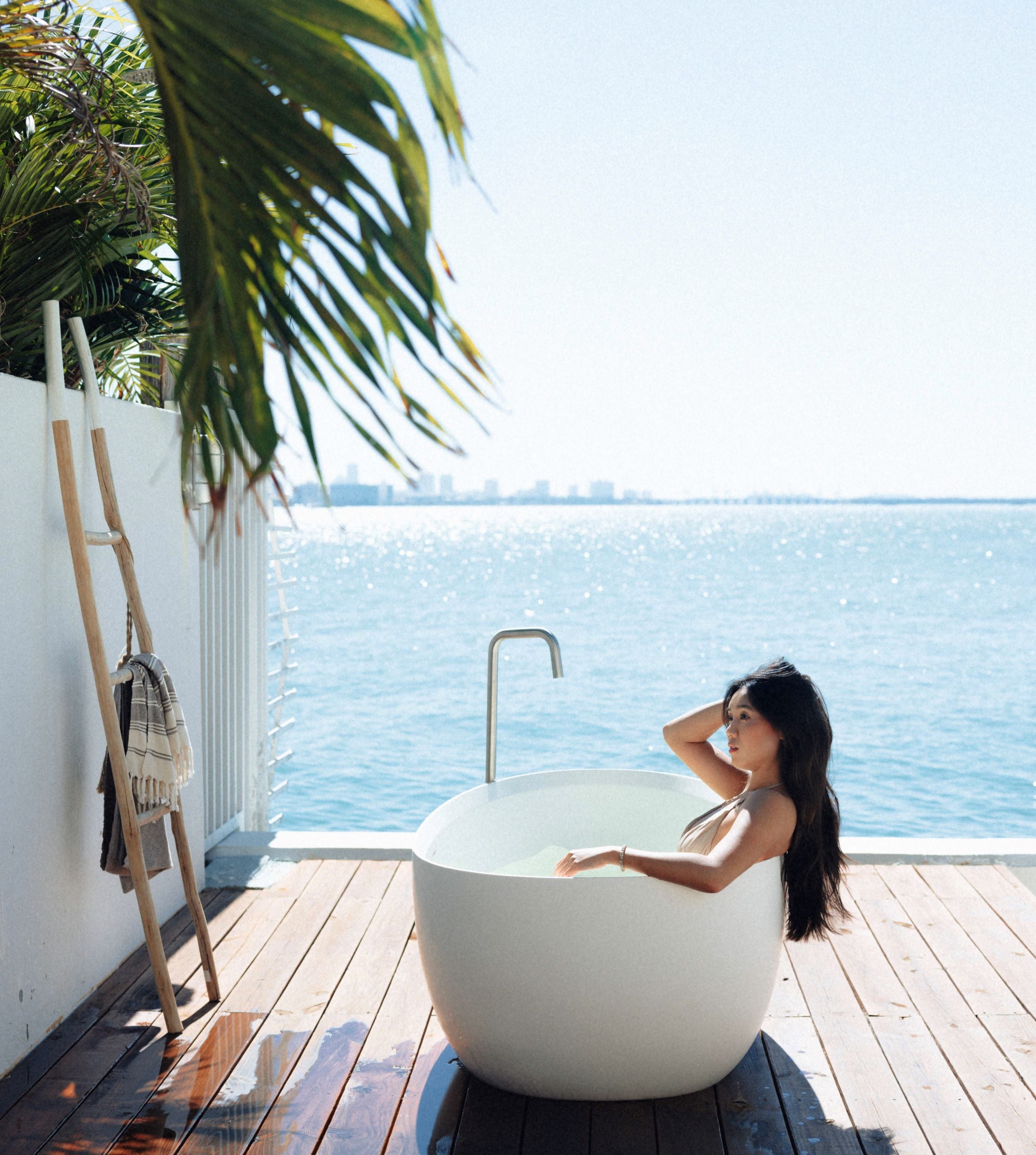 Freestanding Bathtub: Oval Silhouette for Coastal Deck Soaking Tub