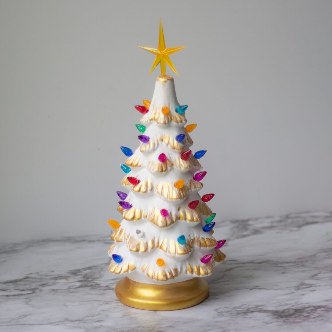 Holiday Decor with Gold Tipped Branches and Rainbow Pegs