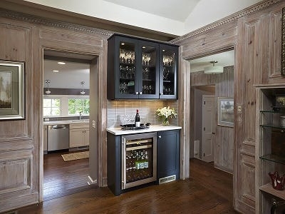 Home Bar Cabinetry with Whitewashed Wood and Glass Fronts
