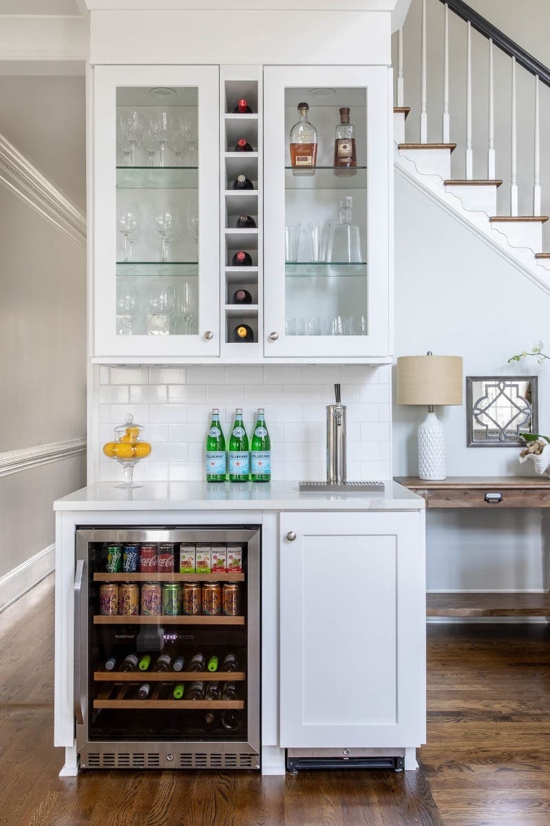 Home Bar with Under Stair Location and Integrated Wine Cubbies
