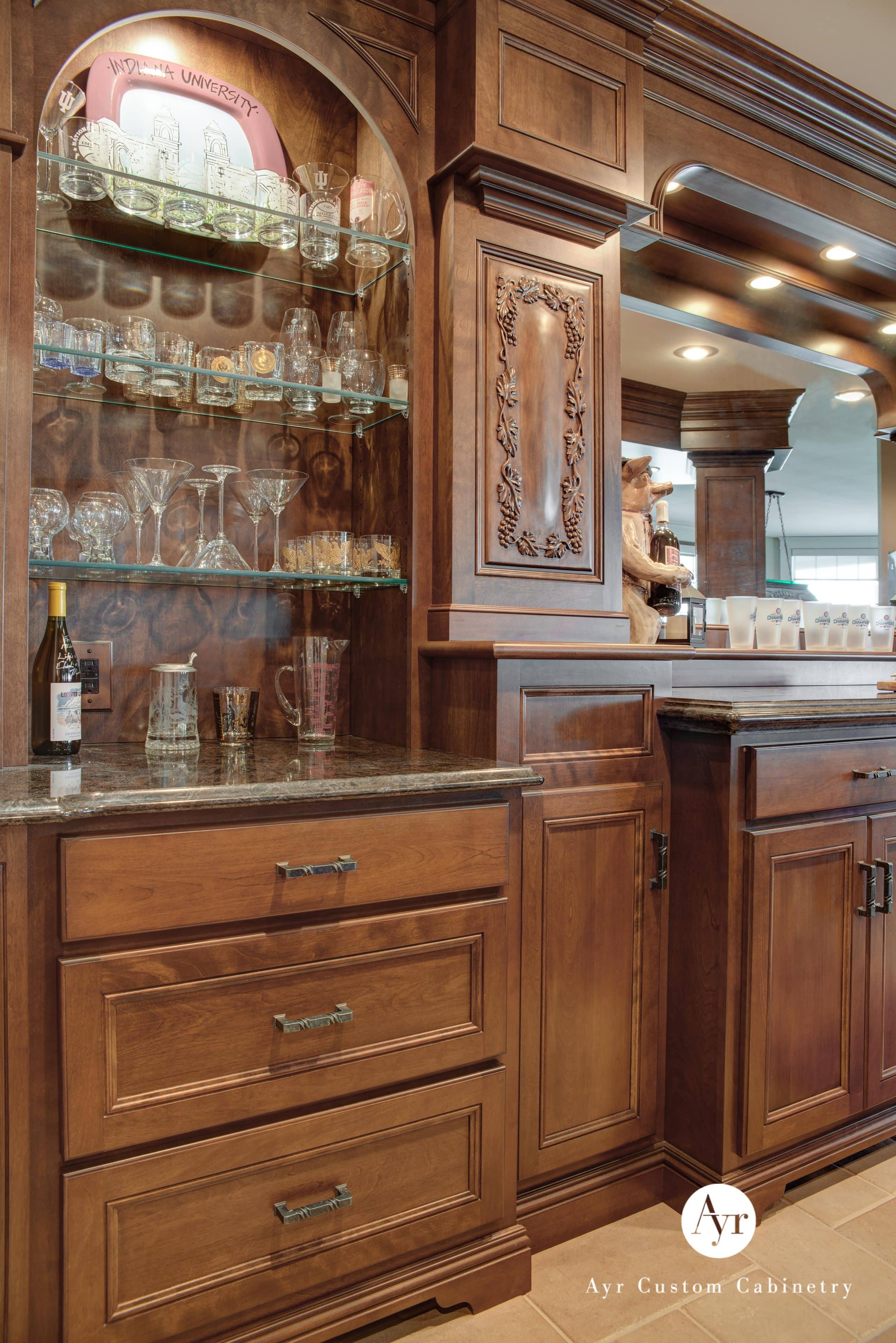 Home Wet Bar with Grapevine Wood Carving and Arched Niche