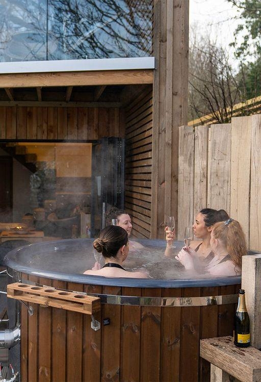 Hot Tub: Wood Clad Exterior and Integrated Tub Glass Rack Ideas