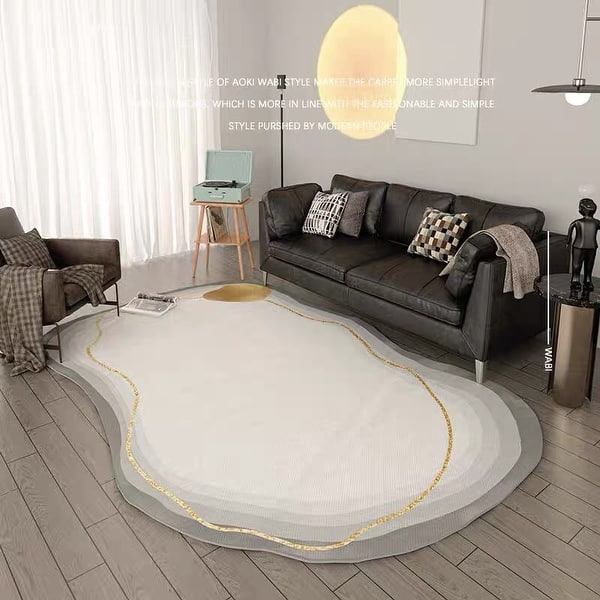 Irregular Cream Area Rug with Gold Accent Line and Concentric Border.