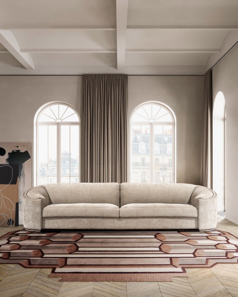 Irregular Geometric Rug Styling with Fringe Detail and Curved Edge.