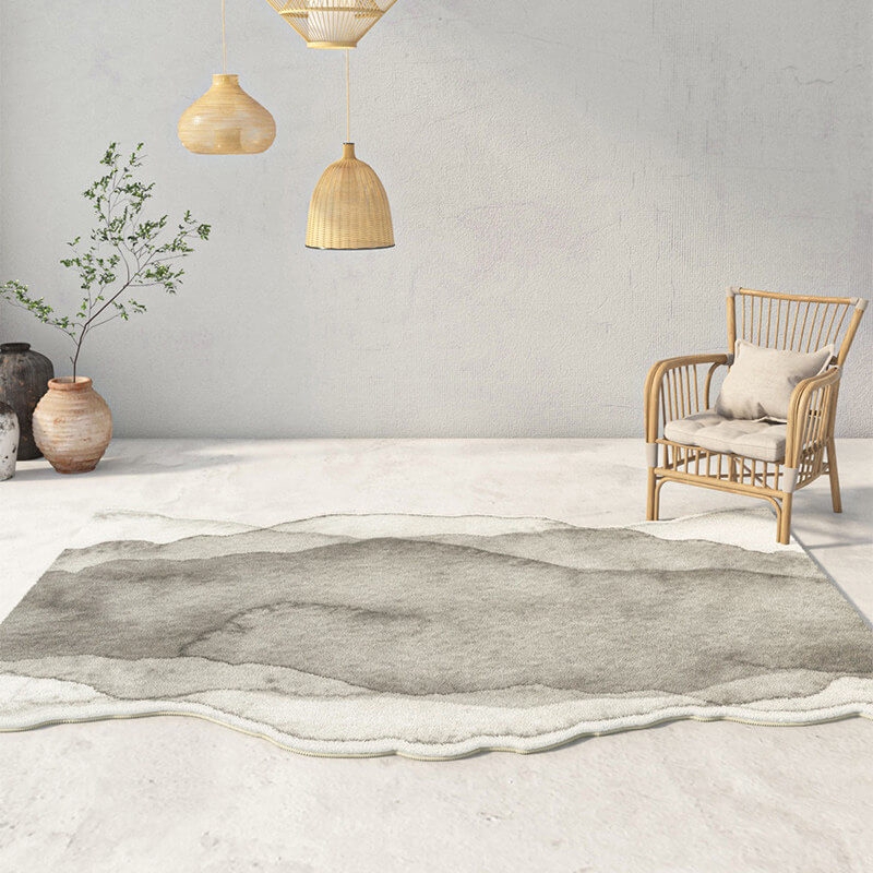 Irregular Rug with Wavy Edge and Layered Neutral Gradient Floor Mat.