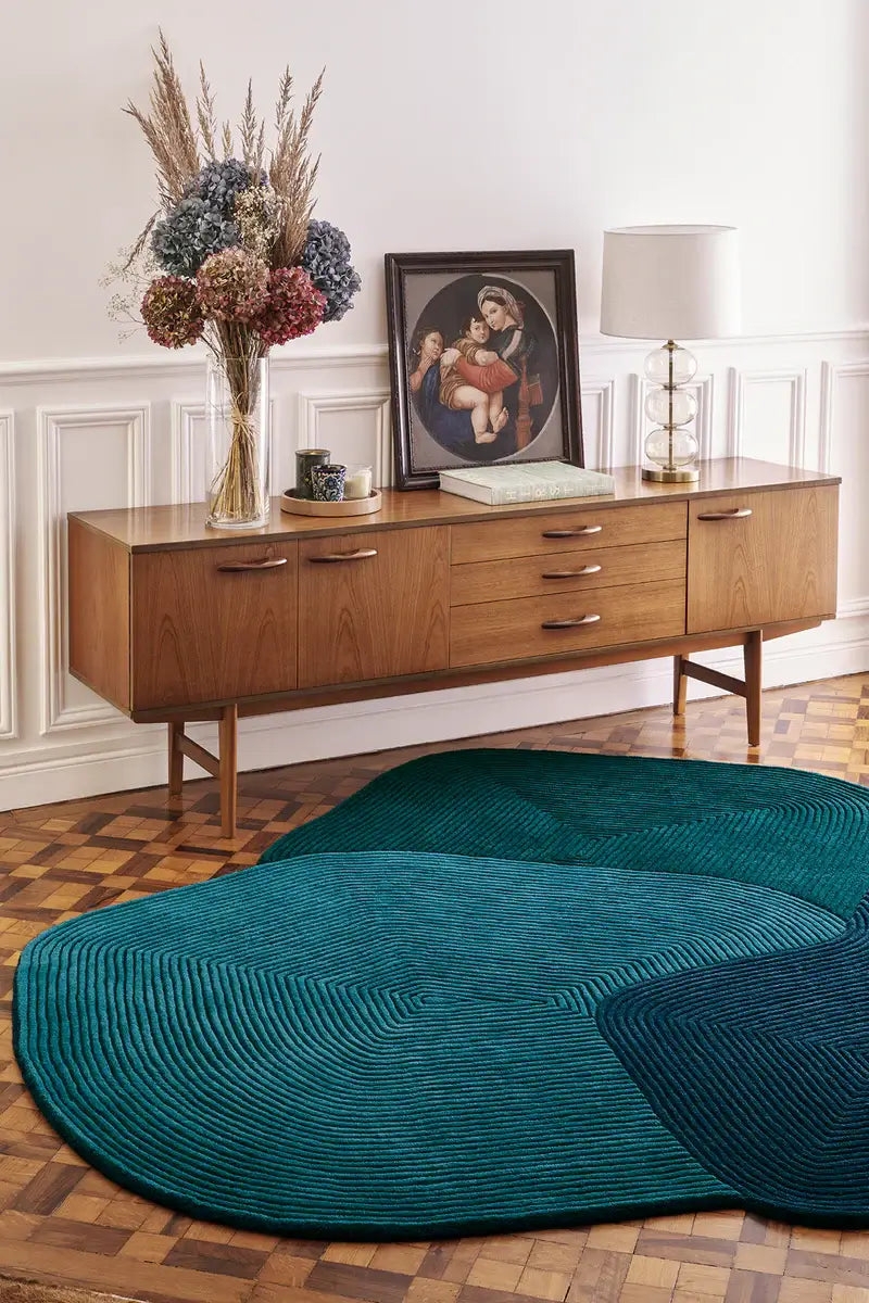 Irregular Shape Rug with Concentric Ribbed Floor Mat Texture in Teal.