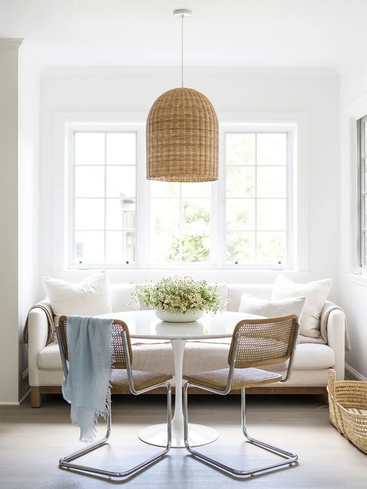 Kitchen Sofa with Cane Cantilever Chairs and Tulip Table