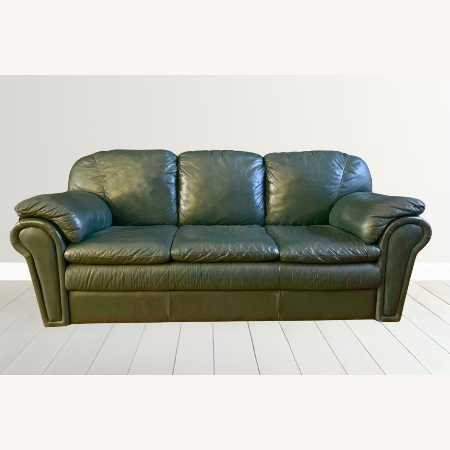 Leather Sofa in Emerald with overstuffed profile