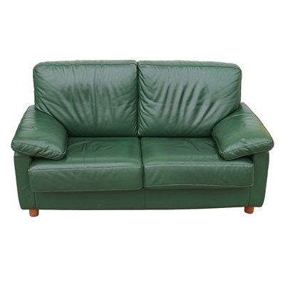 Loveseat in forest green with pillowy arms silhouette