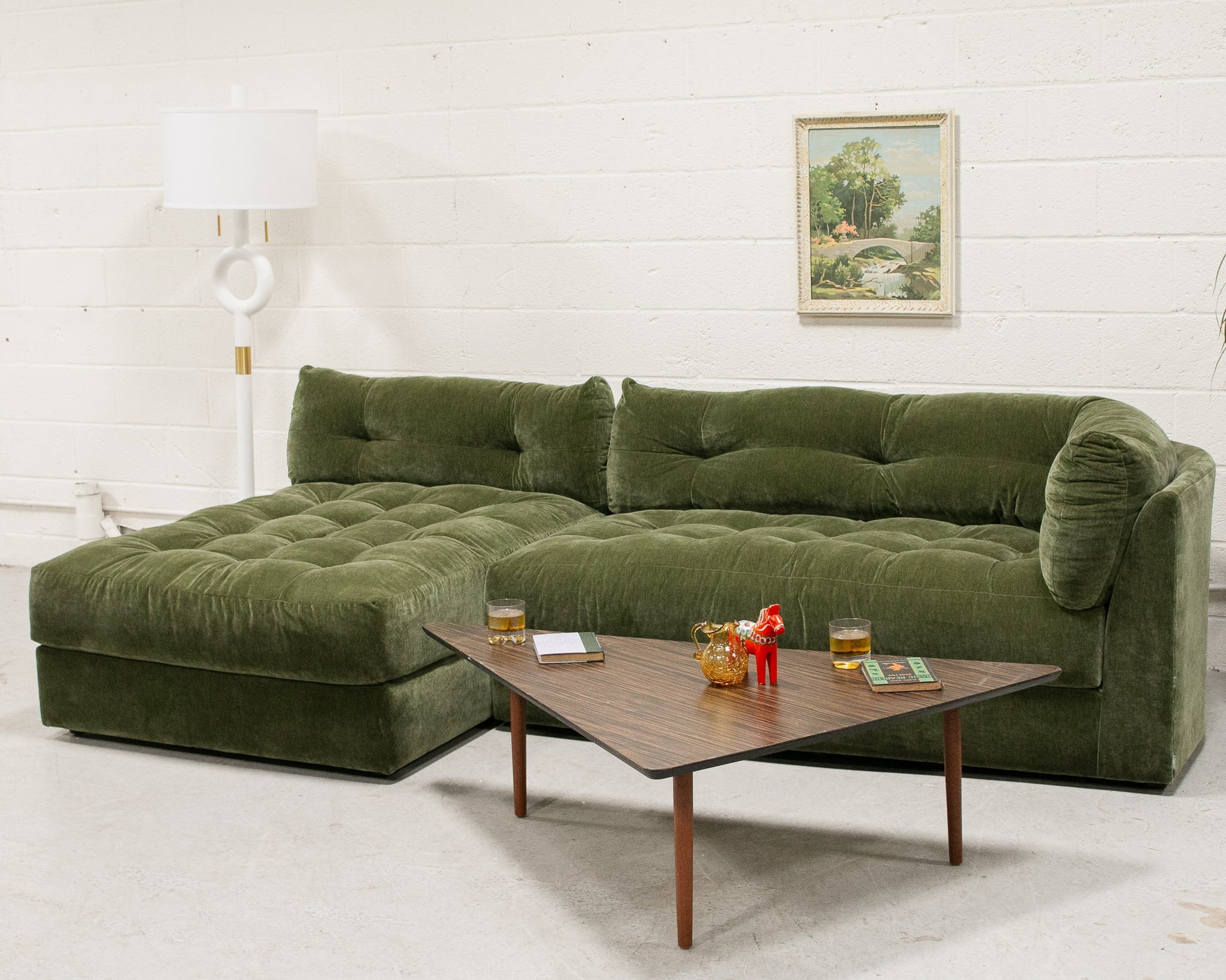 Low Profile Sectional Sofa featuring Biscuit Tufting and Bumper End