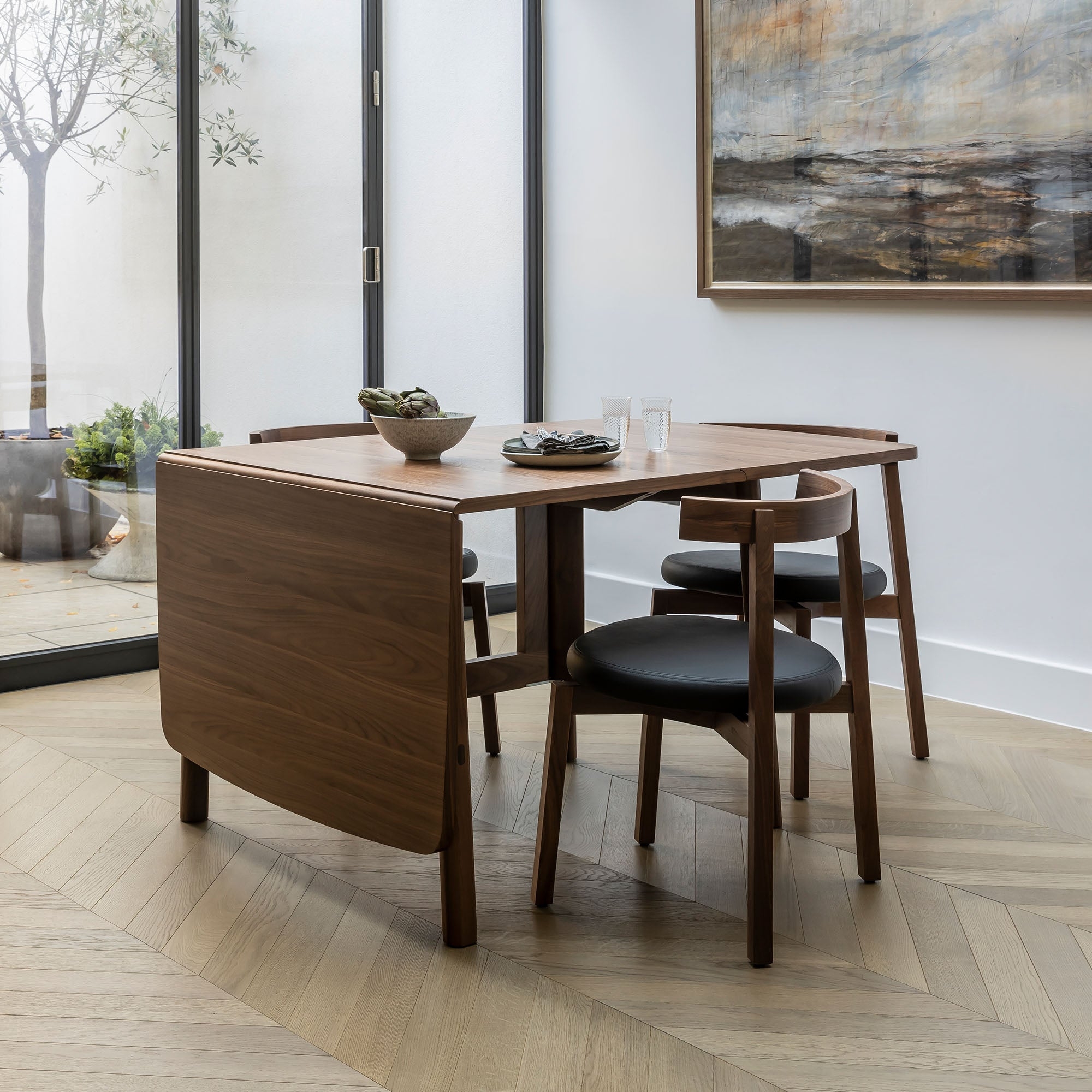 Mid-Century Drop Leaf Table with Curved Back Chairs and Walnut Tone