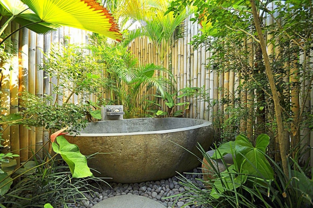 Outdoor Bathtub: Carved Stone Aesthetic and Bamboo Privacy Garden