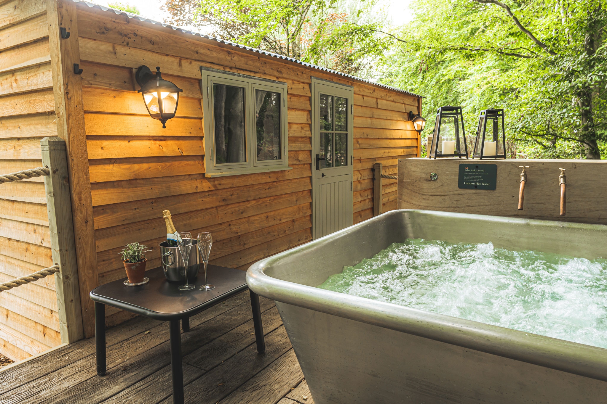 Outdoor Soaking Tub: Metallic Basin for Backyard Hygge Retreat