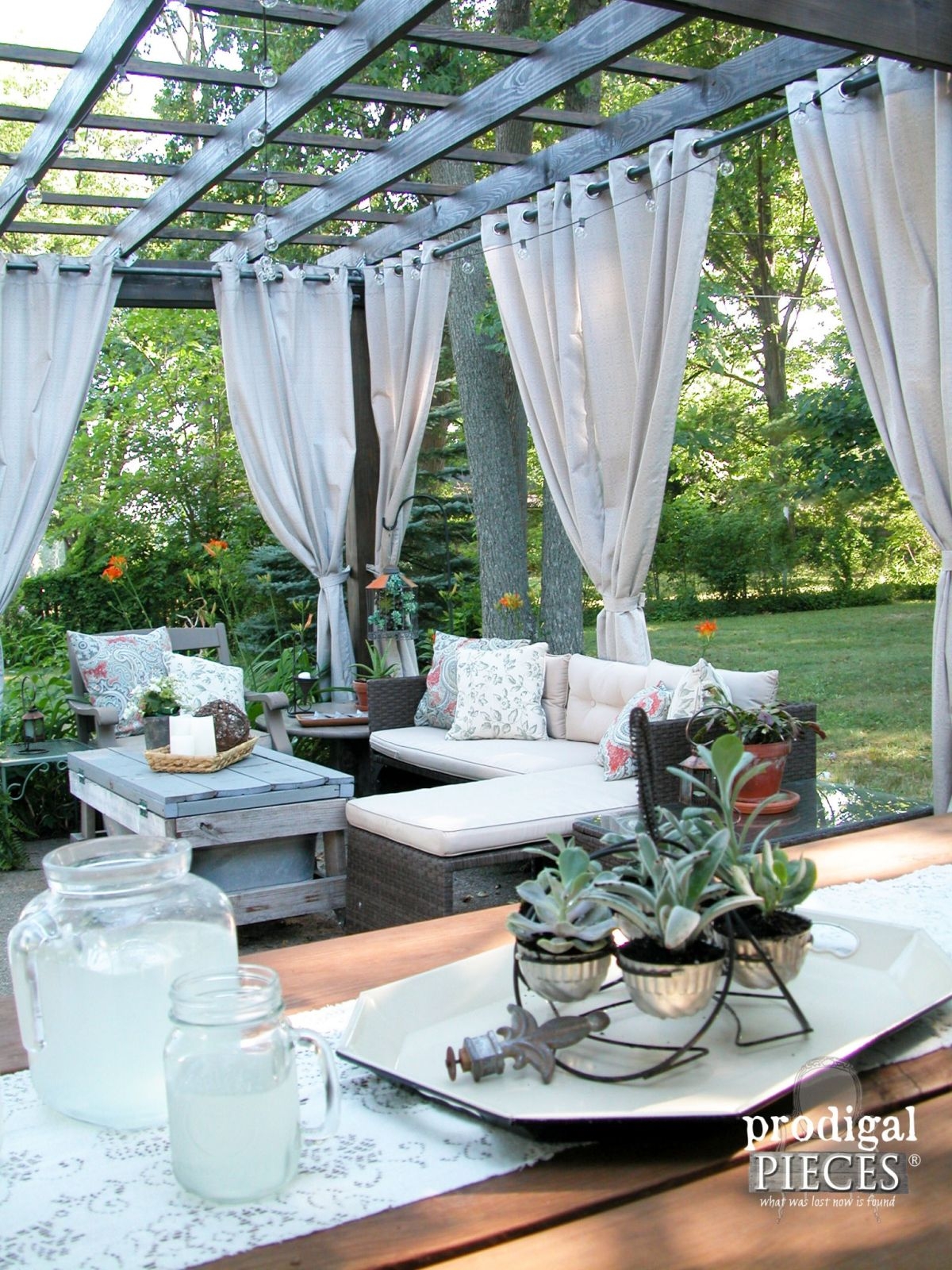 Pergola: Distressed Wood Chest and Grommet Curtains