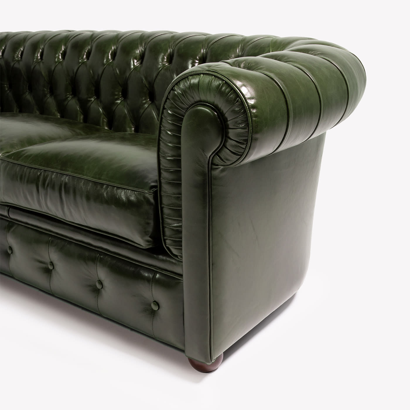 Polished Chesterfield Sofa featuring Rolled Arms and Buttoned Base