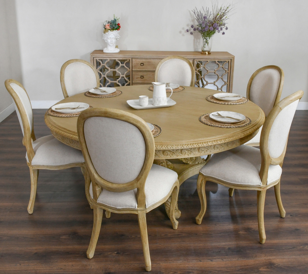 Round Dining Table 72 Inch Distressed Beige with Carved Apron Pedestal.
