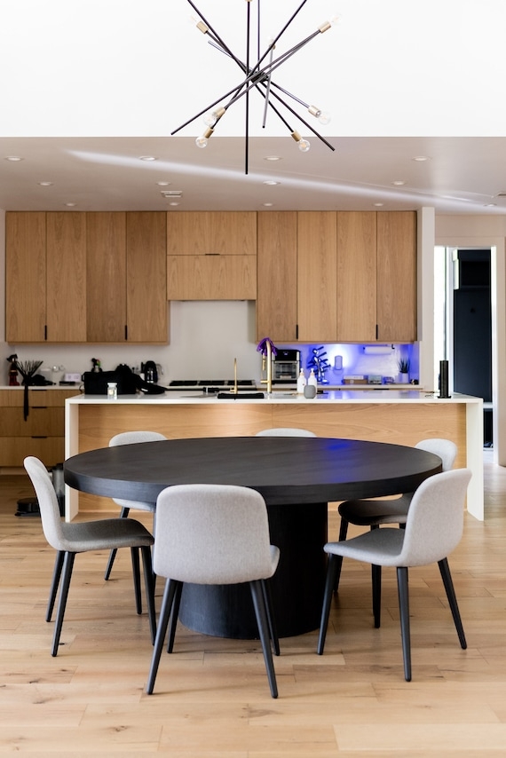 Round Dining Table 72 Inch Matte Black with Minimalist Cylindrical Base.