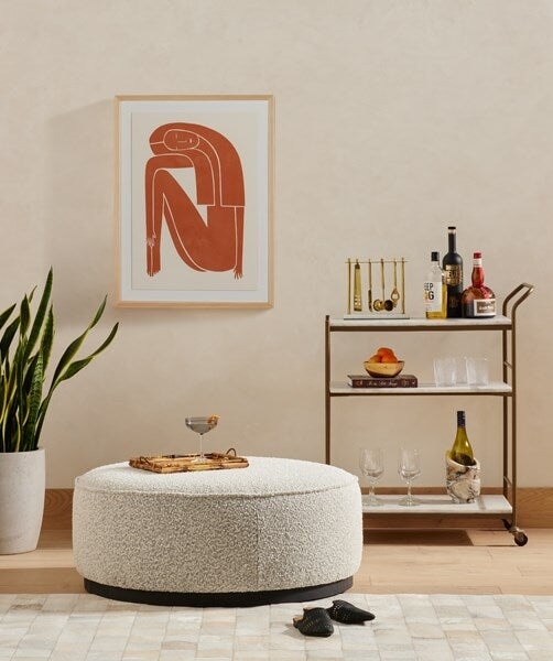 Round Ottoman: Large Boucle Form with Thin Contrast Base