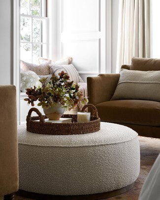 Round Ottoman: Textured Boucle Shape with Wood Base Detail
