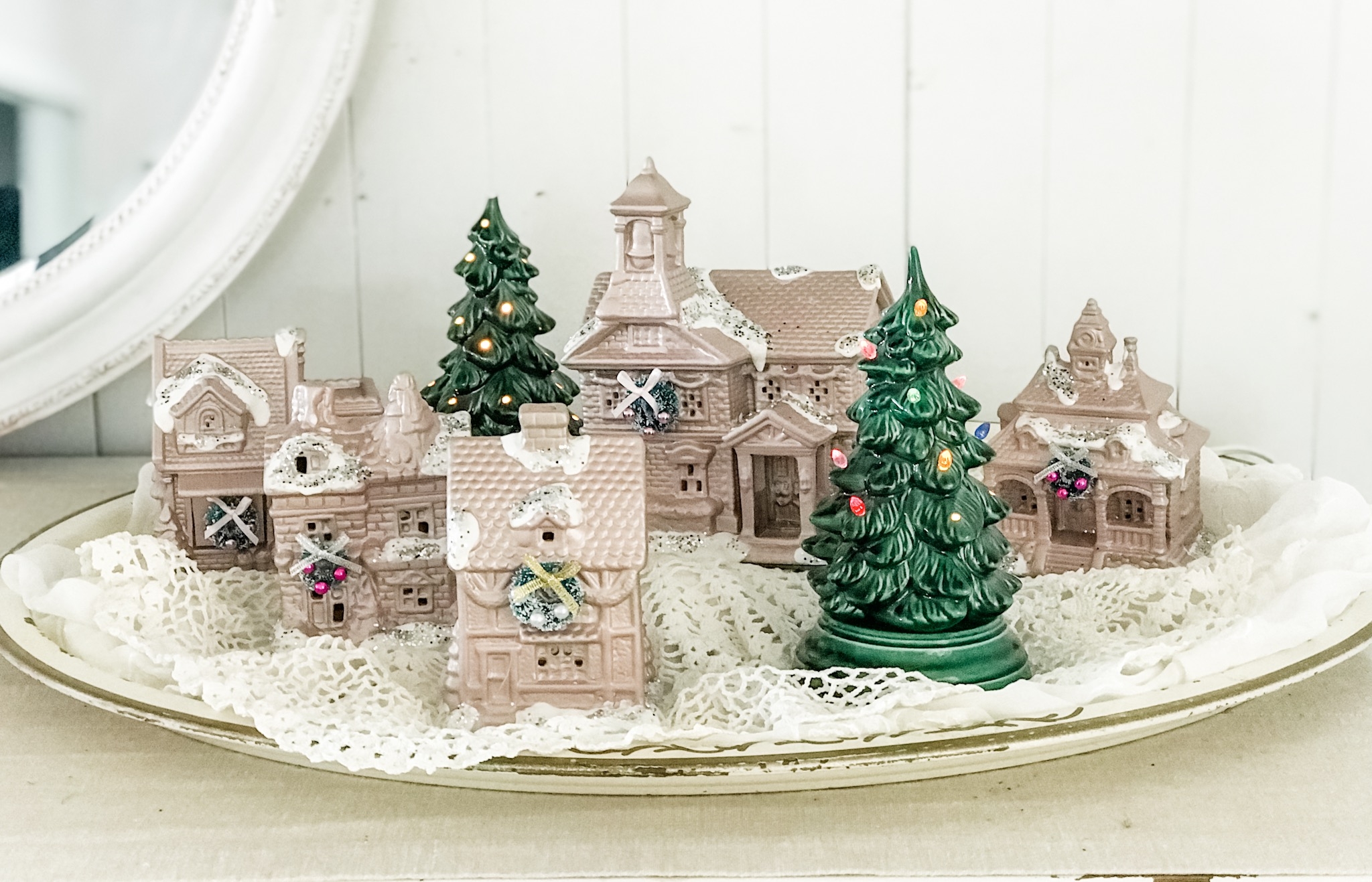 Seasonal Decor: Blush Pink Houses with Vintage Lit Ceramic Trees