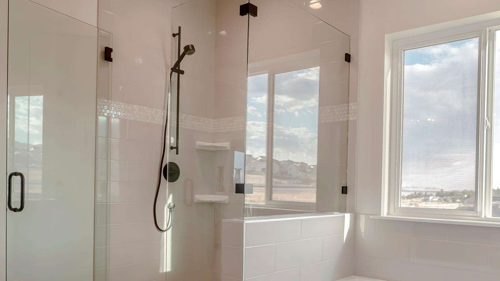 Shower Enclosure with Pony Wall Base and Matte Black Accents