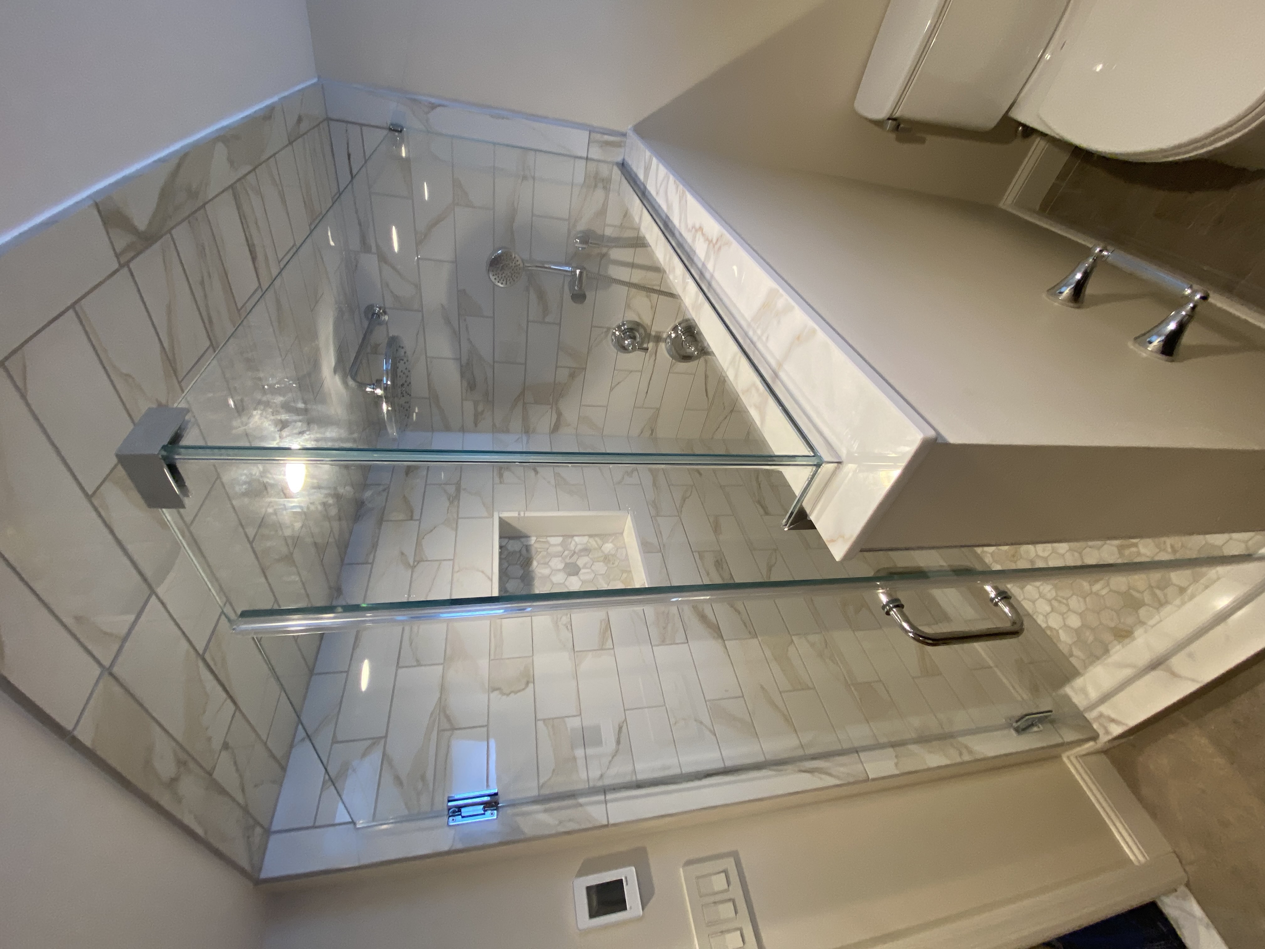 Shower Enclosure with Slanted Ceiling Fit and Marble Tile