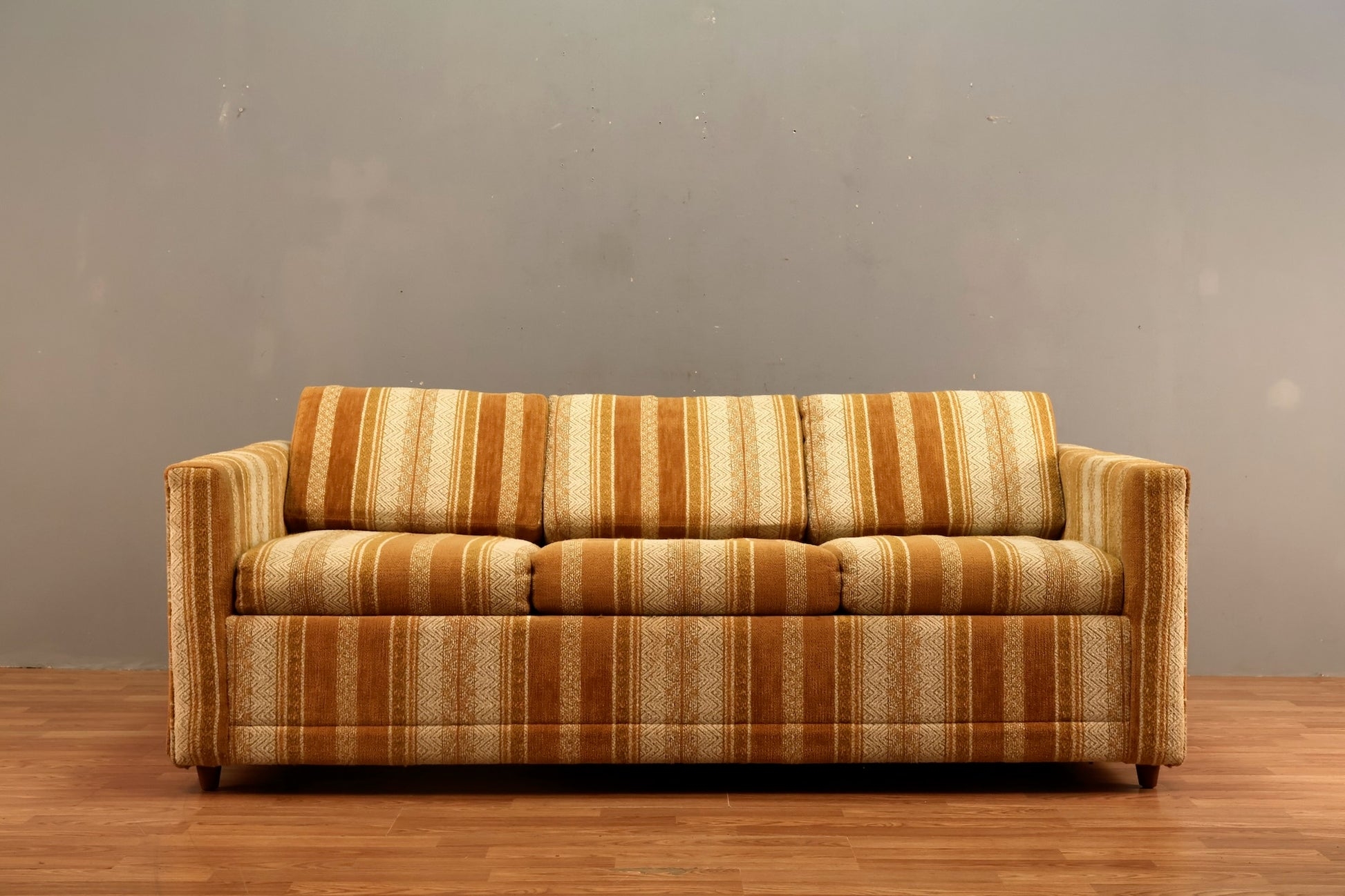 Sleeper Sofa Featuring Harvest Color Palette and Vertical Stripes