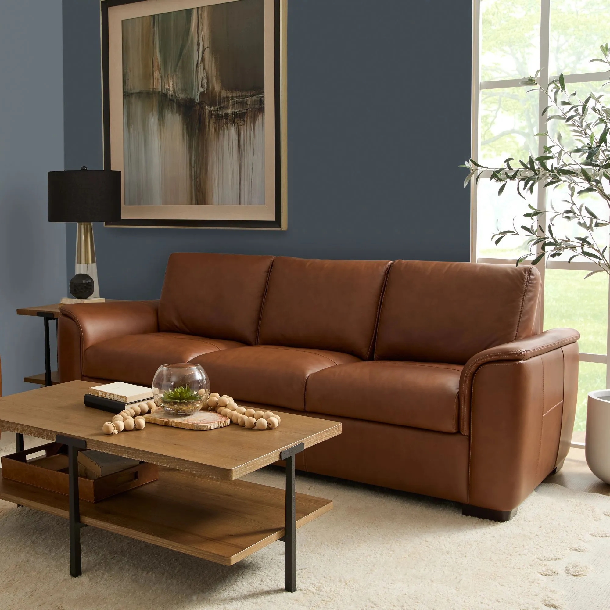 Sofa Featuring Flared Track Arms and Leather Three Seater