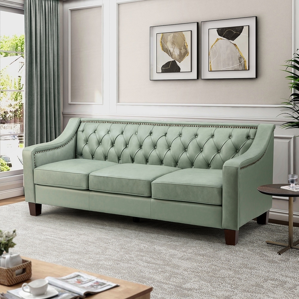 Sofa: Sage Green Leather Couch and Nailhead Trim
