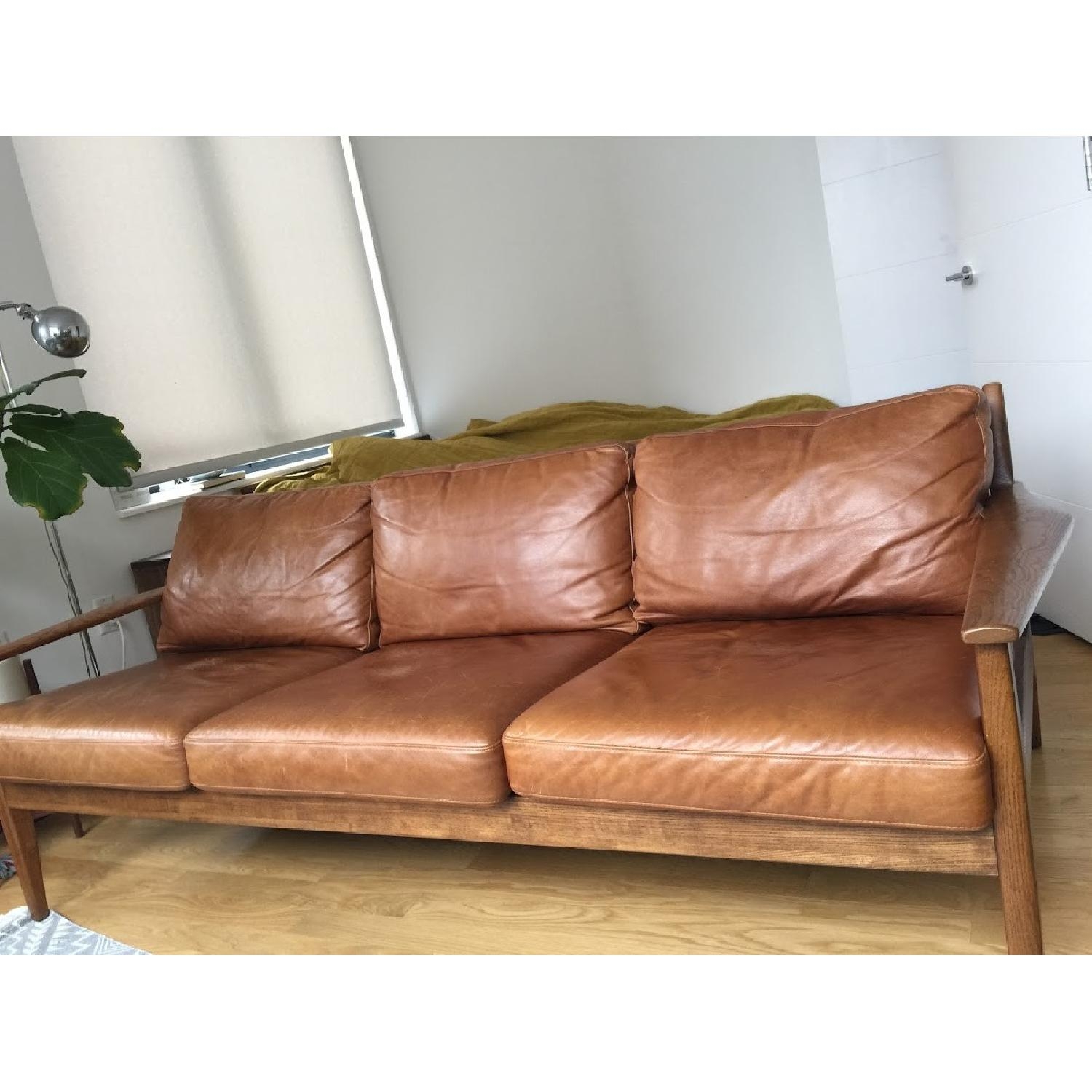 Sofa with Cognac Leather and Exposed Wood Frame Accent