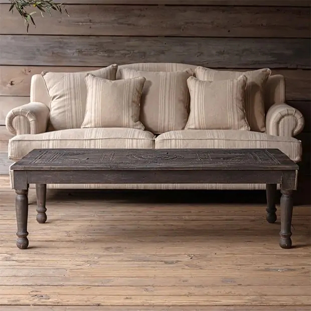Sofa With Ticking Stripes and Distressed Carved Wood Top